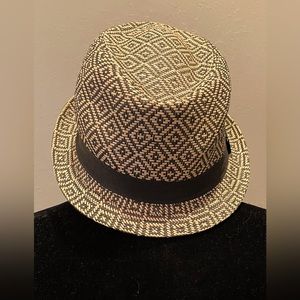Very cute weaved hat with a black band one size tan and black